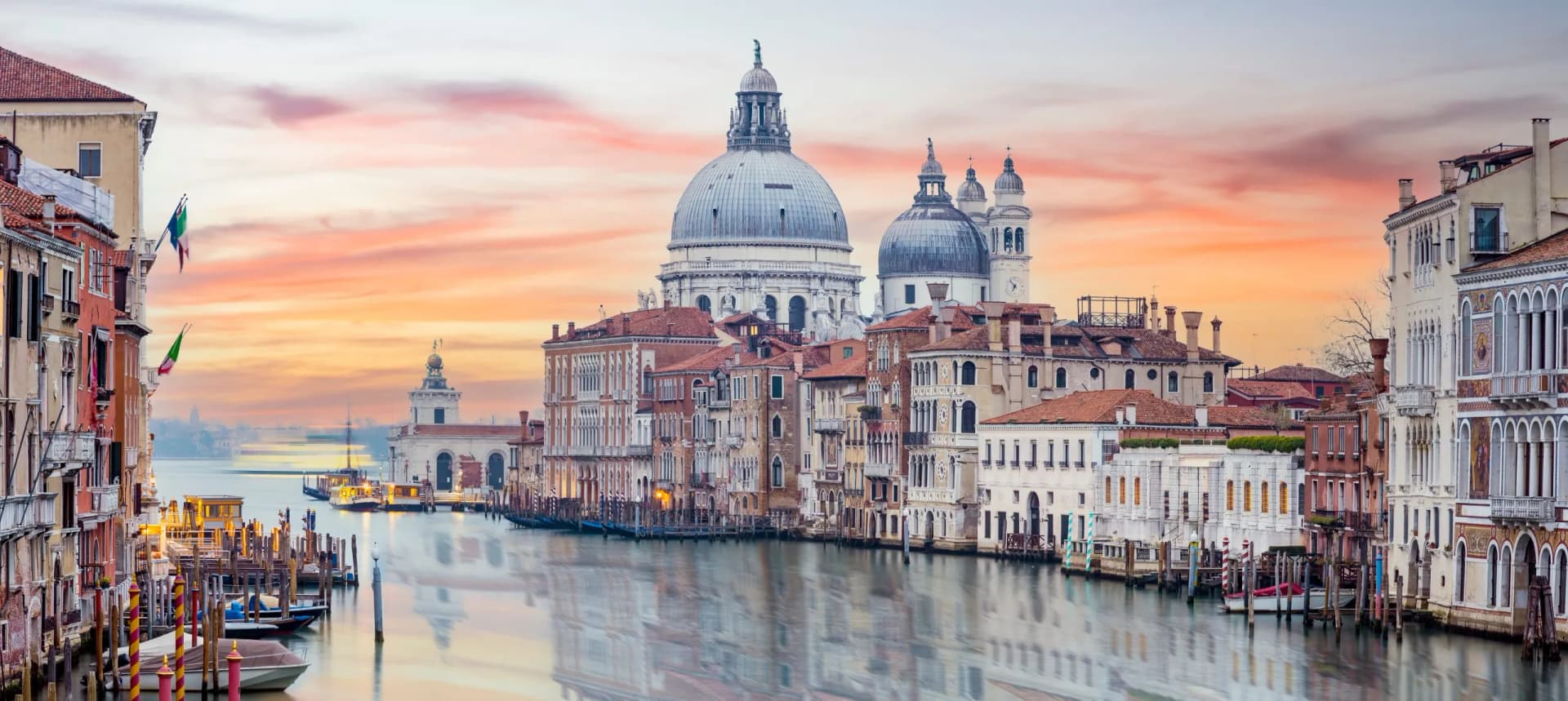 Grand Canal panorama in Venice with Santa Maria della Salute at sunset