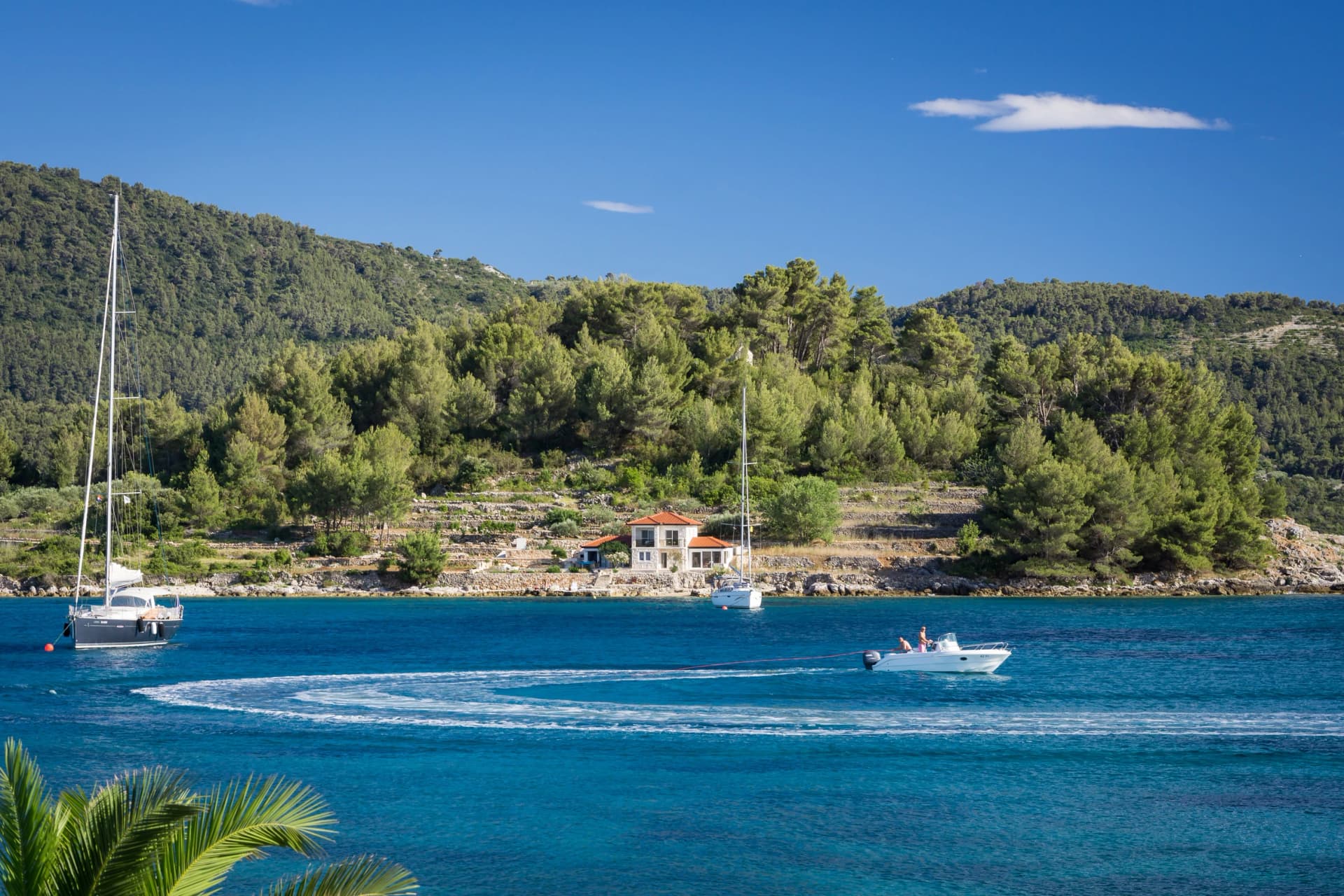 Yachts on blue lagoon bay at Croatia