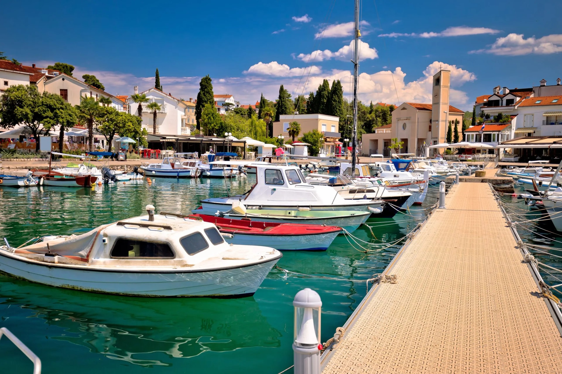 Town of Malinska harbor and waterfront view