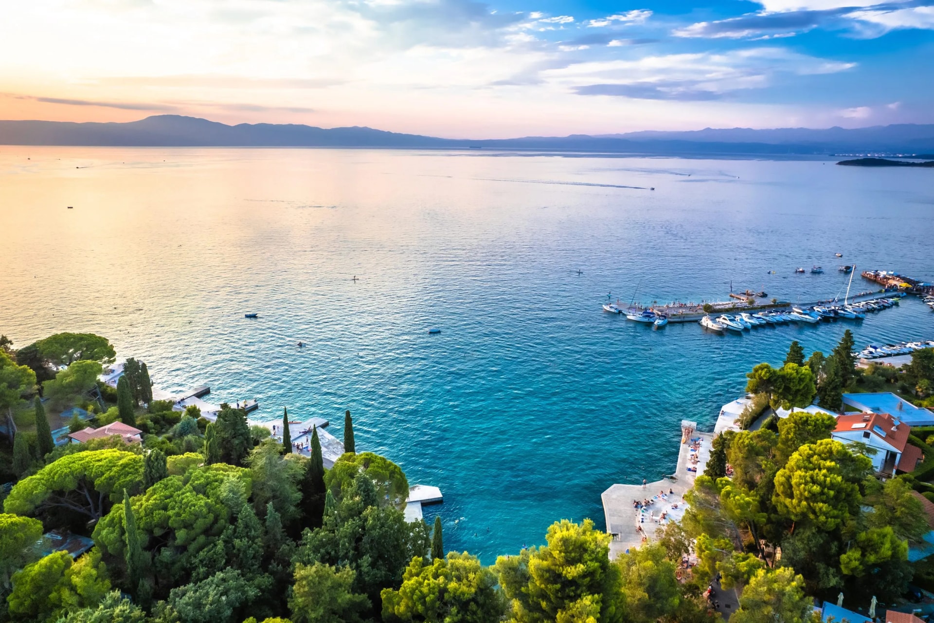 Malinska waterfront beach and turquoise coastline sunset view