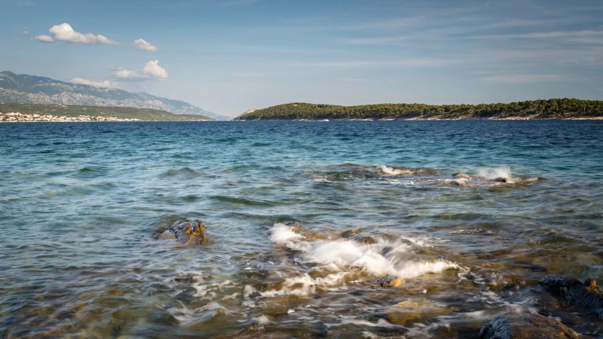 rocks at the coastline of Rab Croatia on channel of Barbat