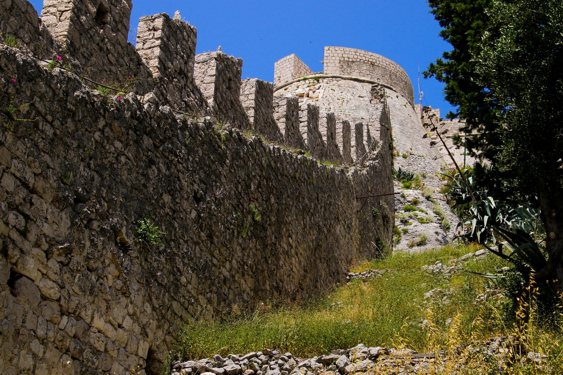 Steep stone wall of the Spanjola Fortress above Hvar on the eponymous Croatian island