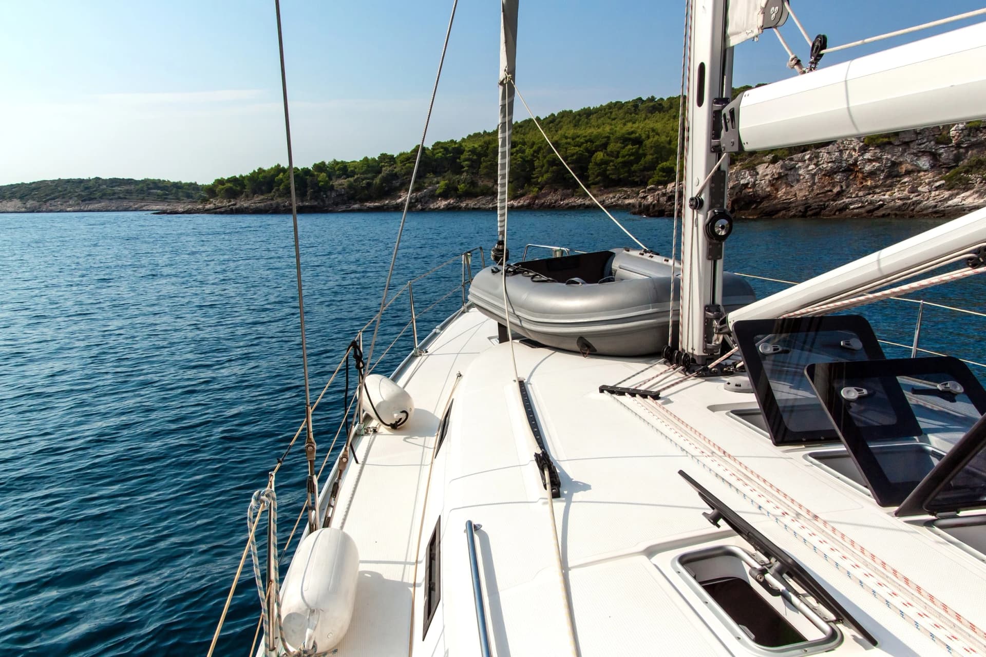 Sailing holidays in Croatia. Romance of yachting. Sailing on the sea near Croatian islands. Yacht deck. Adventure cruise.