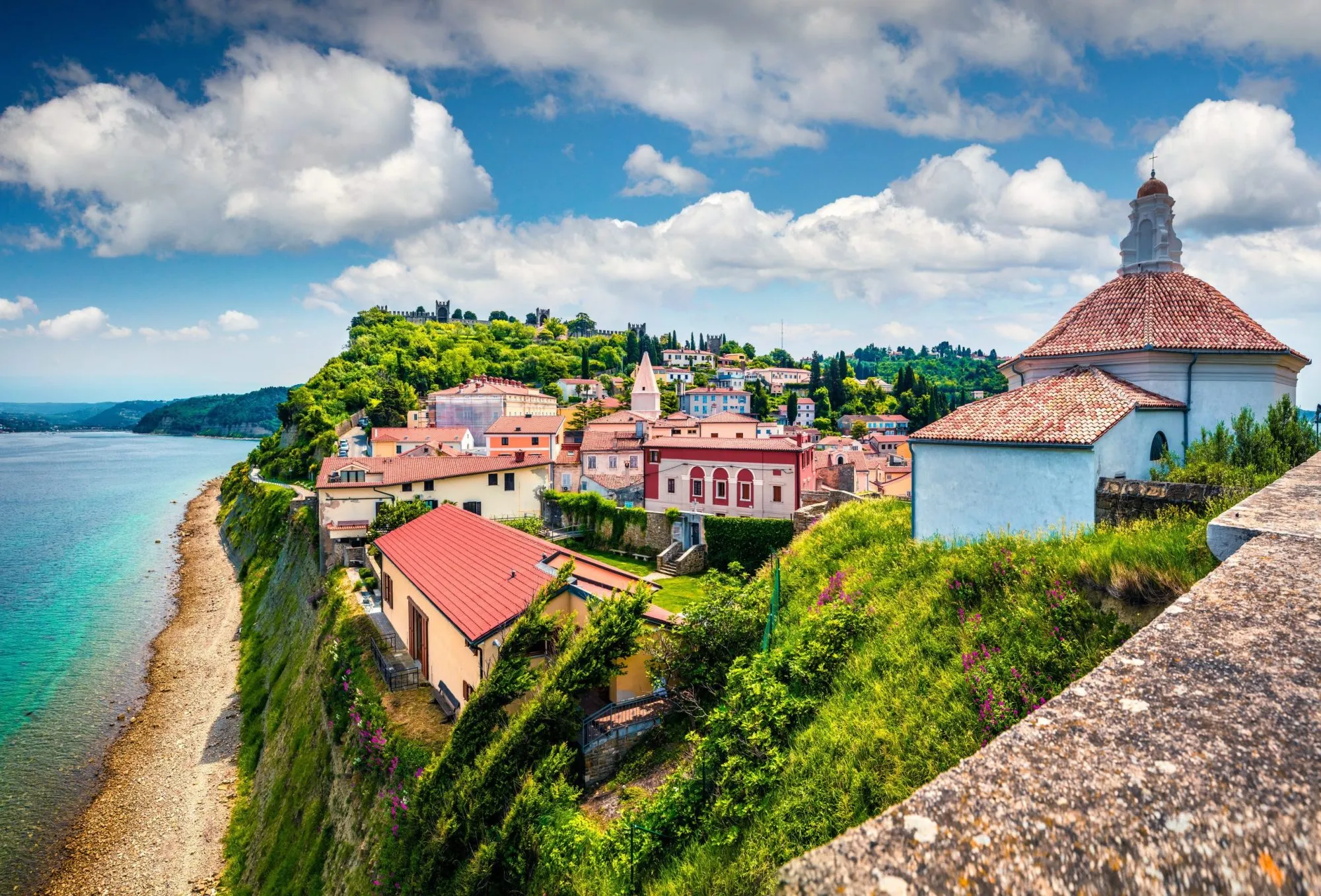 Bright view of old town Piran. Splendid spring morning on Adriatic Sea. Beautiful cityscape of Slovenia, Europe. Traveling concept background. Magnificent Mediterranean landscape.